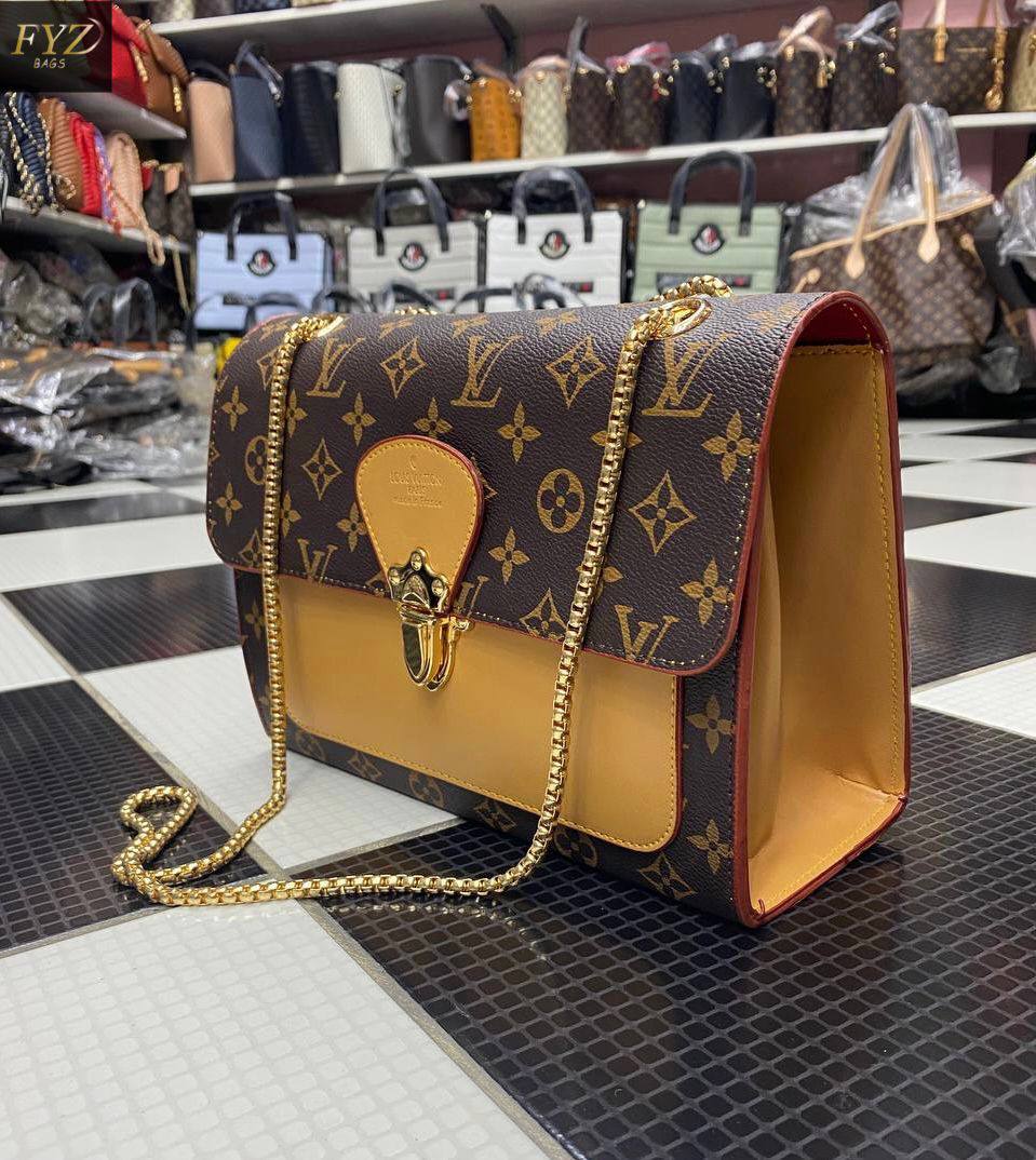 Louis Vuitton Monogram Victoria chain crossbody bag